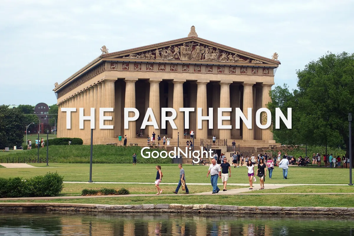 The grand exterior of The Parthenon in Centennial Park, with visitors strolling the lush green lawn, and reflections visible in the nearby water. The iconic columns and lively park atmosphere highlight Nashville’s rich cultural offerings just a short drive away.